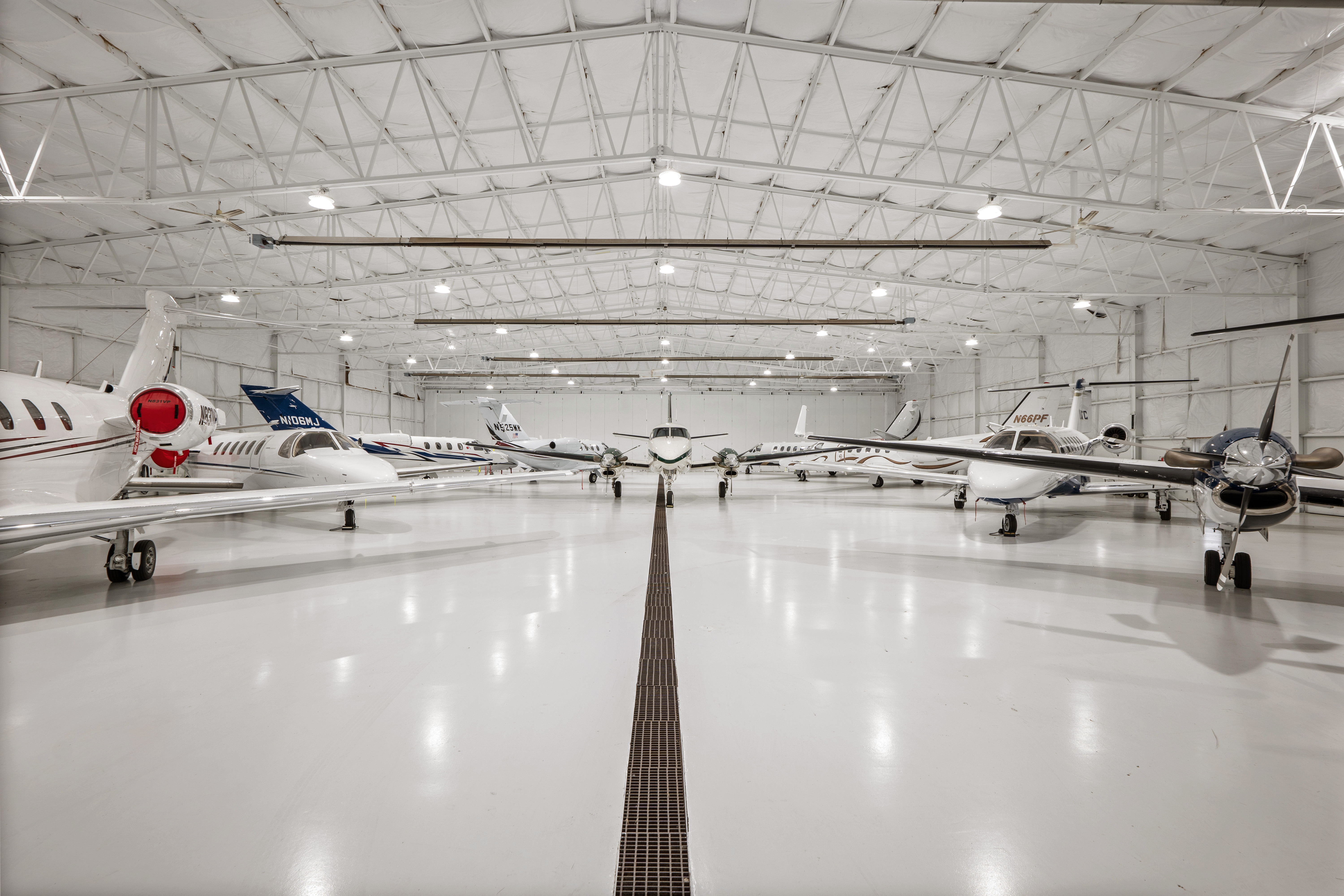 Aircraft hangar at Michigan Aviation with multiple jets