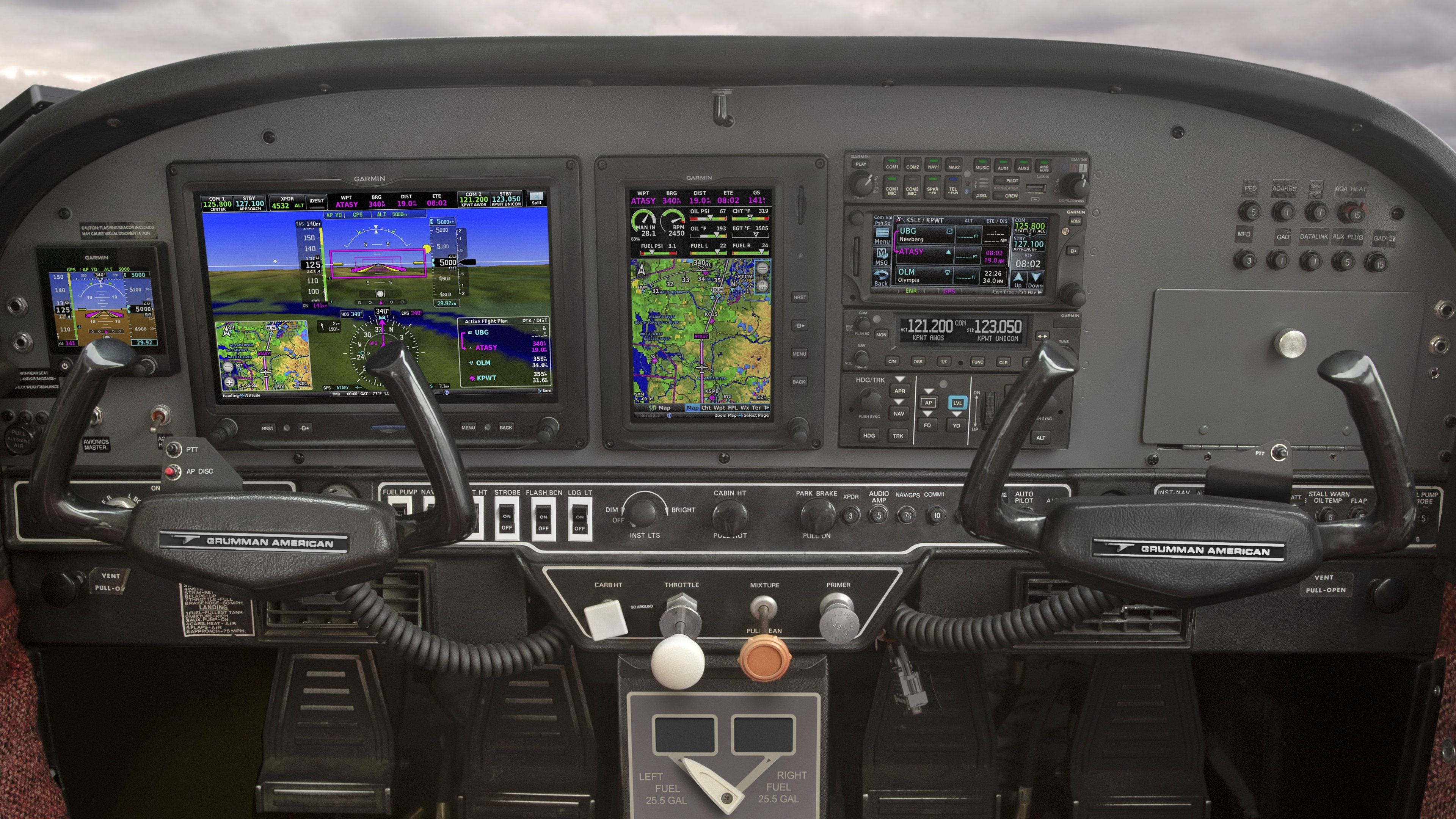 Garmin G3X Touch retrofit with dual touchscreen displays, GTN navigator, and GFC autopilot controller installed in a Grumman American panel